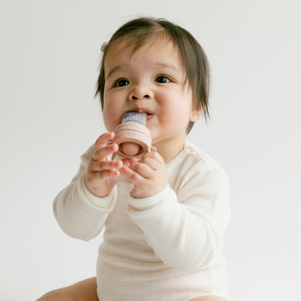 blush coloured baby feeder