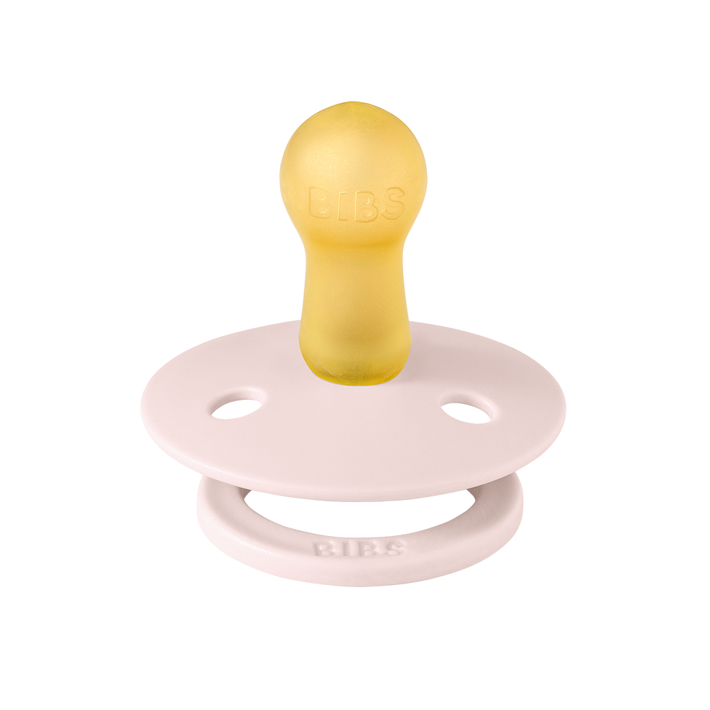 light pink coloured latex round pacifiers